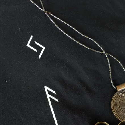 Susanne wearing Custom rune-name tee